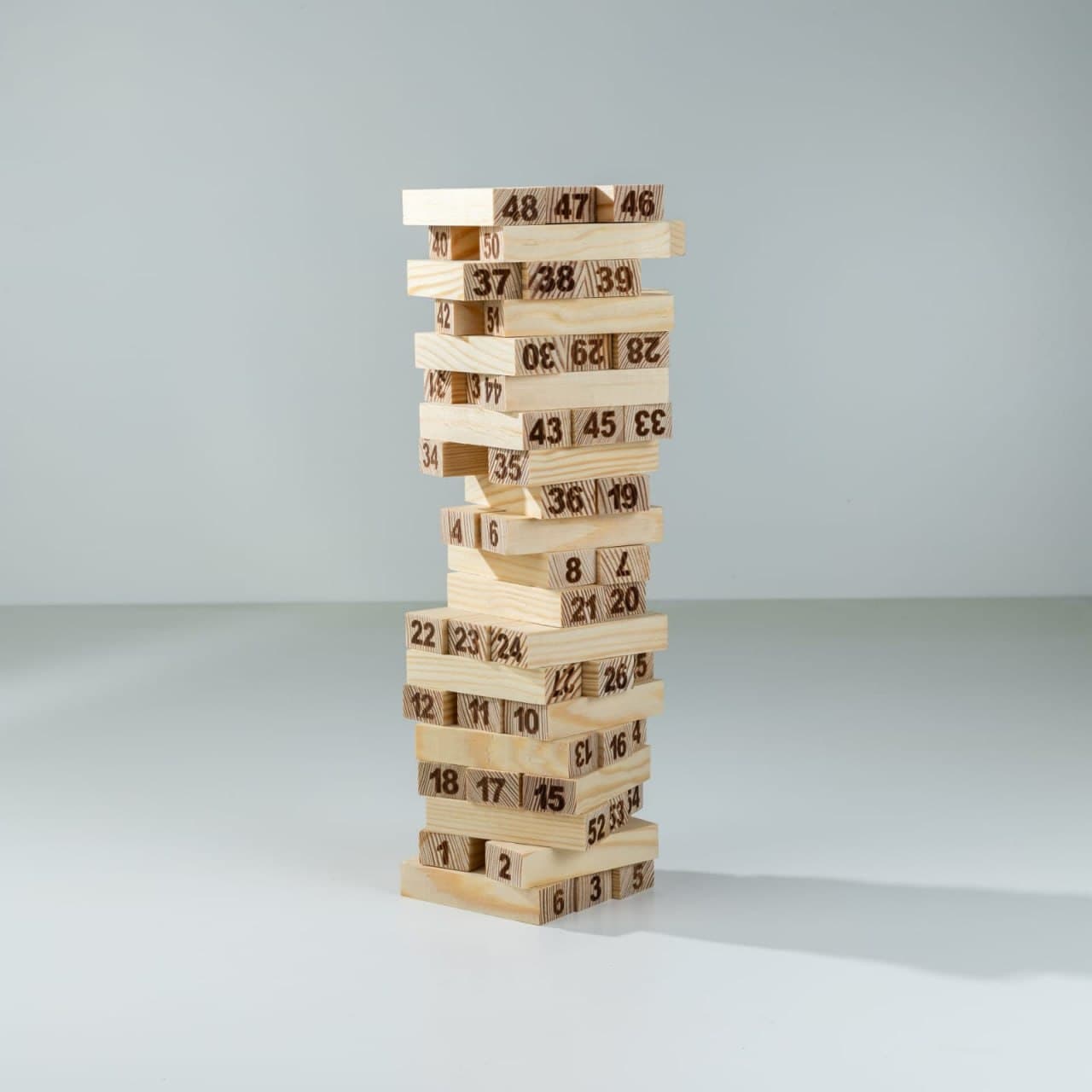 Wooden Number Tumbling Tower – 54 Piece Stacking Block Game with Dice thumbnail 4